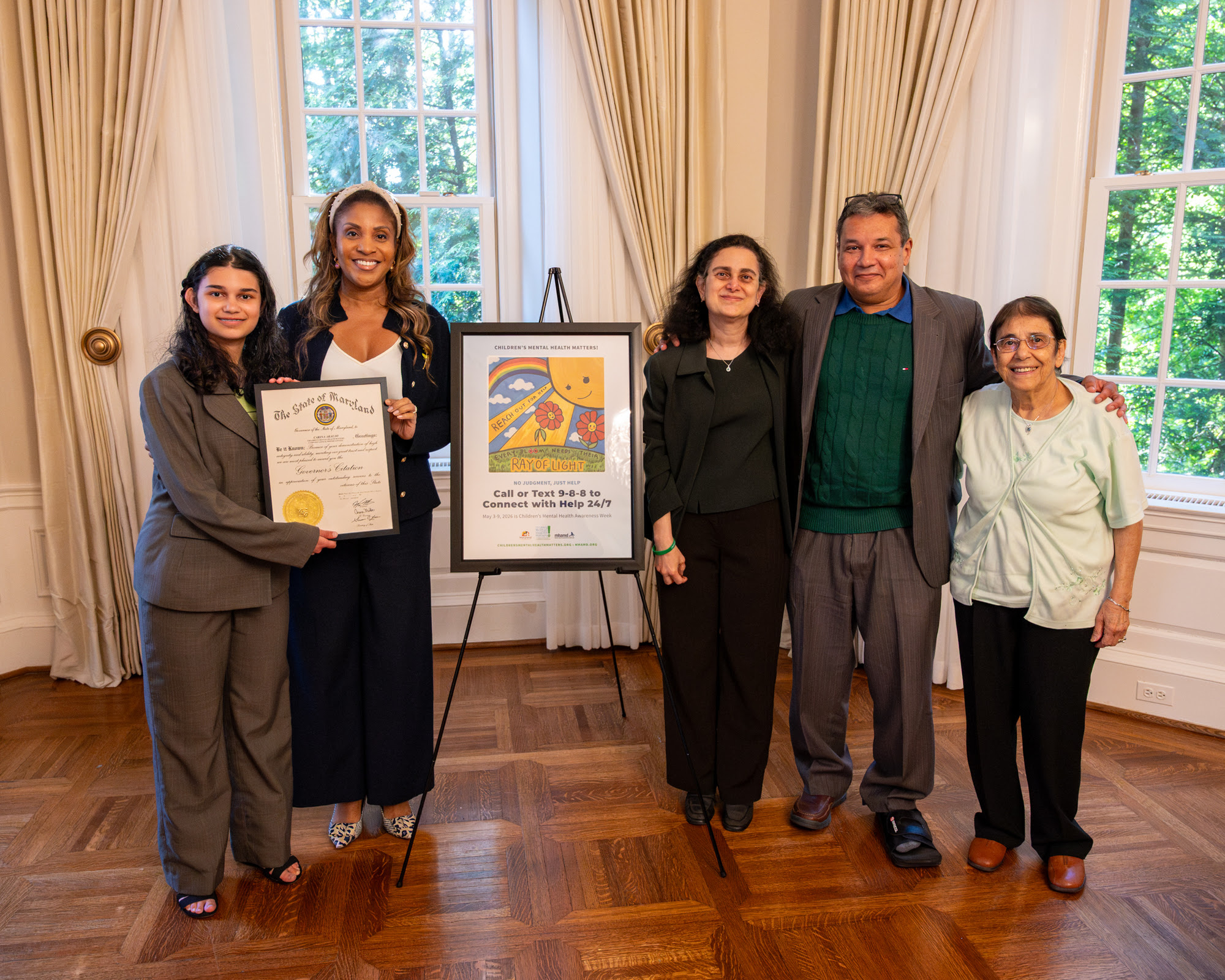 Poster contest winner and family